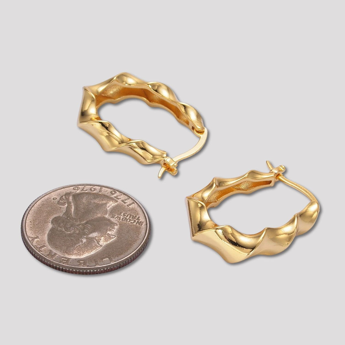 Launch Promo: 24K Gold PVD Stainless Steel Irregular Twisted Hoop Earring in Gold & Silver