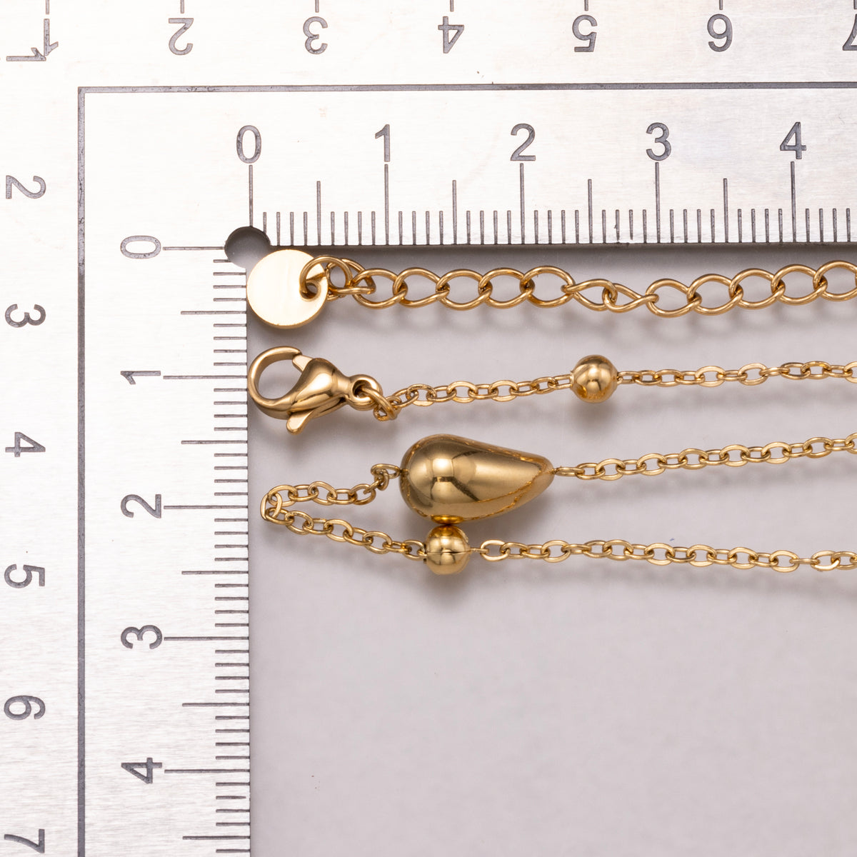 Gold PVD Stainless Steel Teardrop & Satellite Station Chain Necklace Necklace